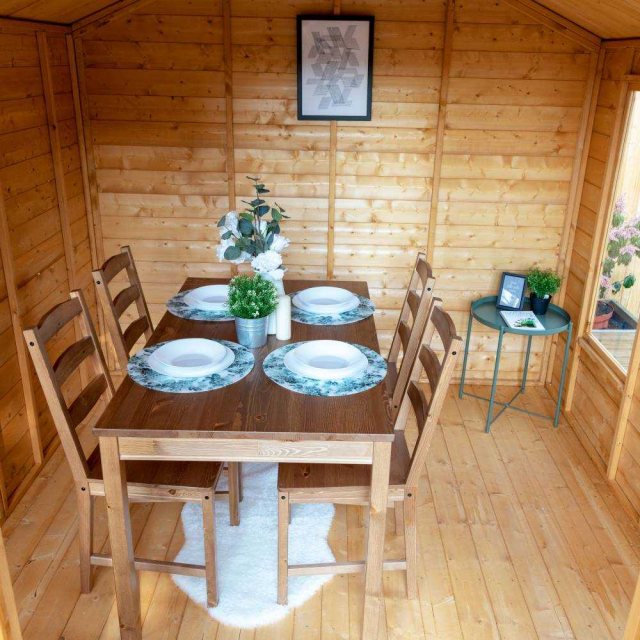 8 x 10 Mercia Premium Traditional T&G Summerhouse with Veranda - dining room set up