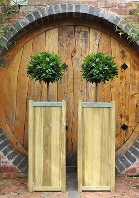 Forest Slender Planter - Large - Pressure Treated - in a pair in front of a door